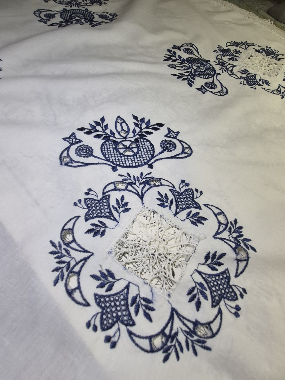 Embroidered White Tablecloth with Navy Blue Floral Motif